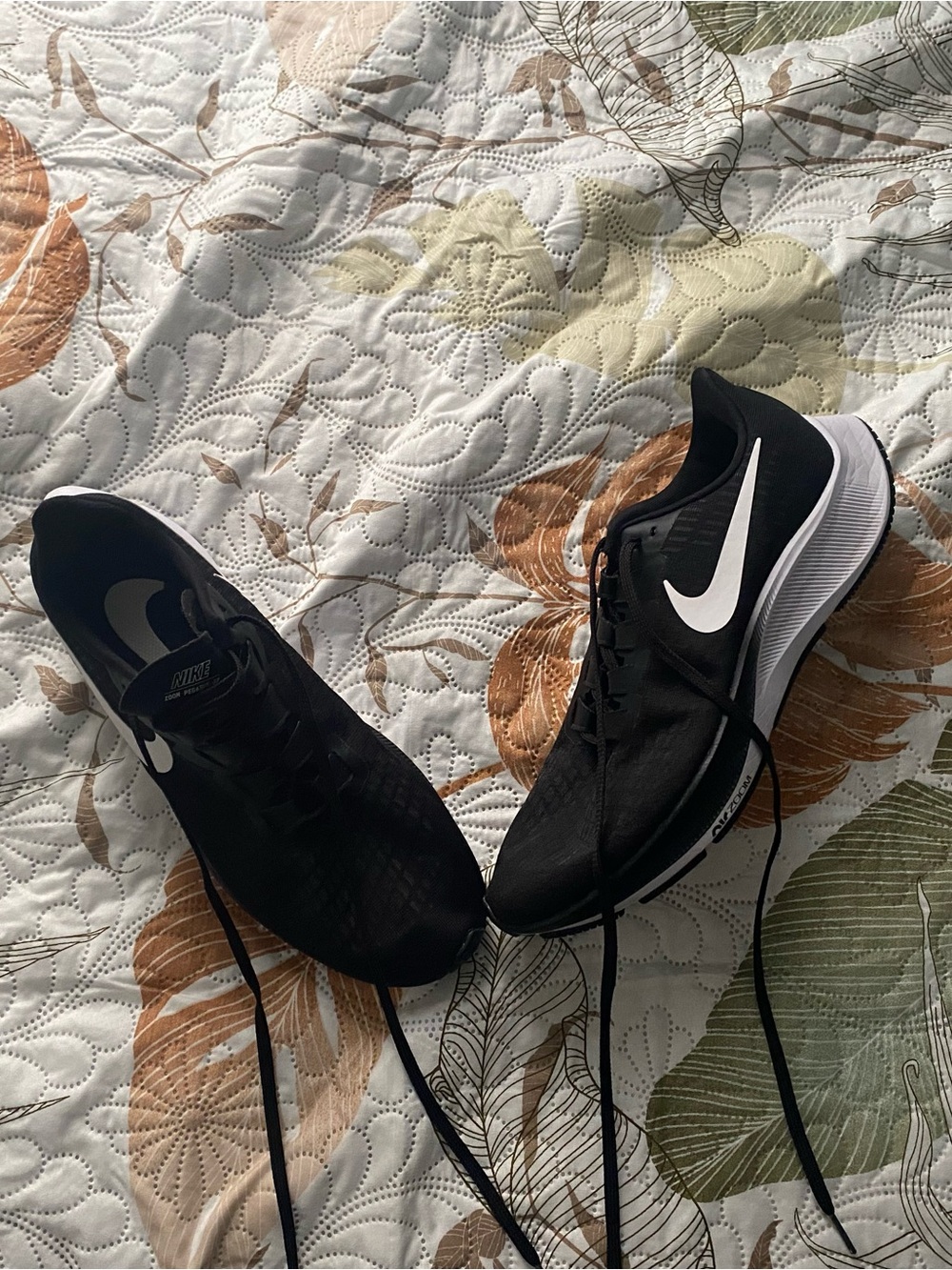 Nike Women’s Black Running Shoes with White Swoosh
